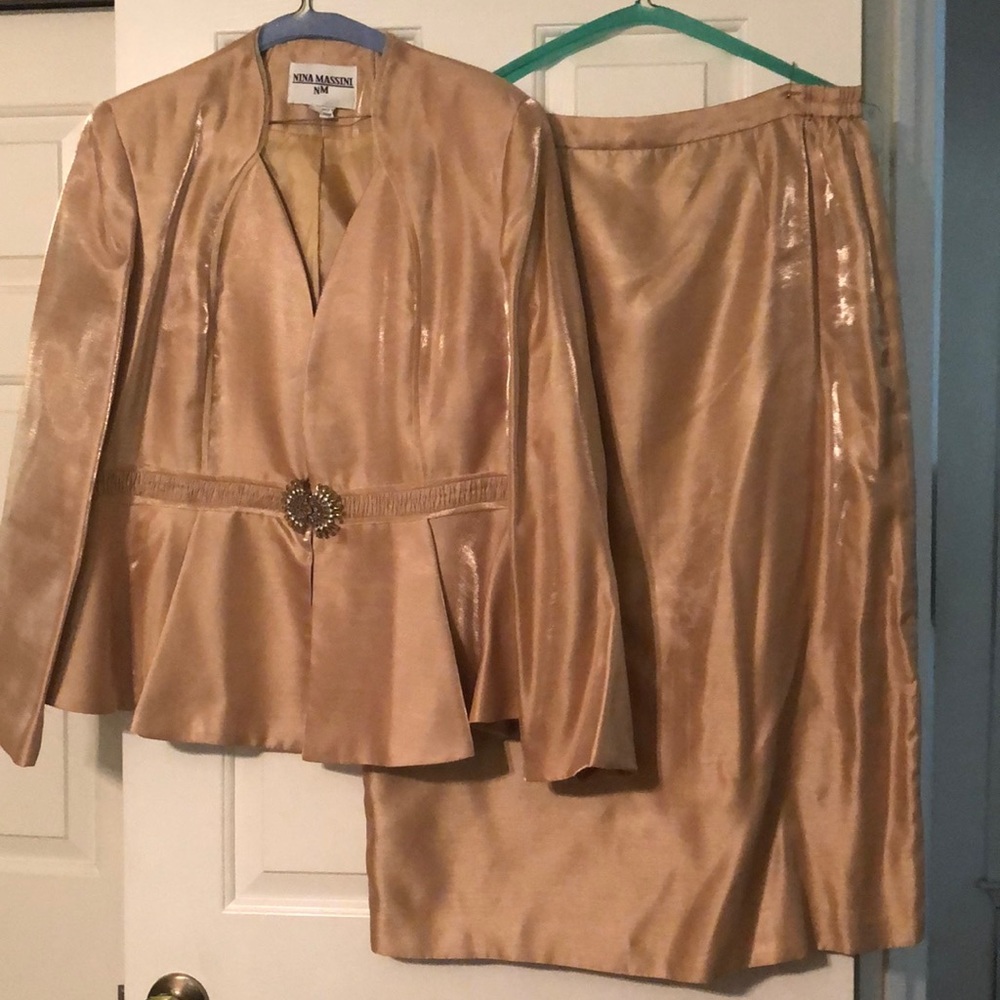 Women’s suit by Nina Massini